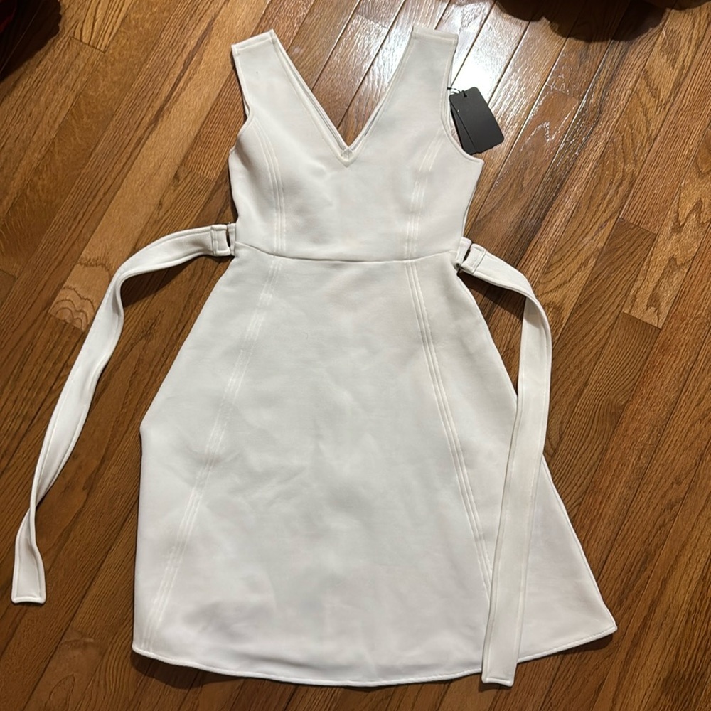 A brand new white Armani Exchange dress.